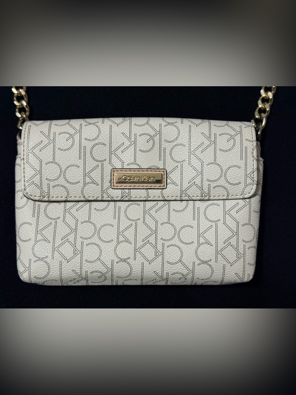 Calvin Klein Cream Monogram Wristlet Clutch with Gold Plaque